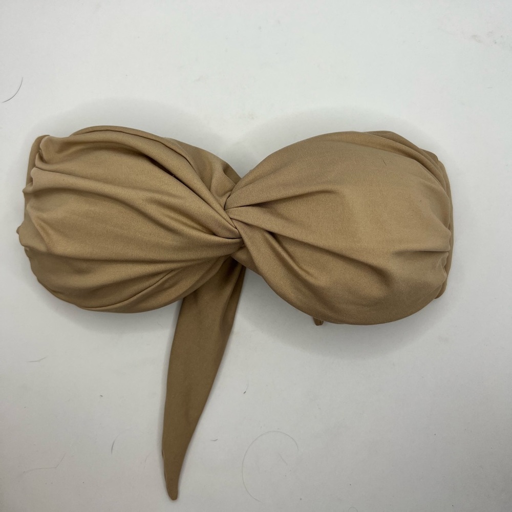 Bought in Maui from local San Lorenzo shop. Size small. Tan.